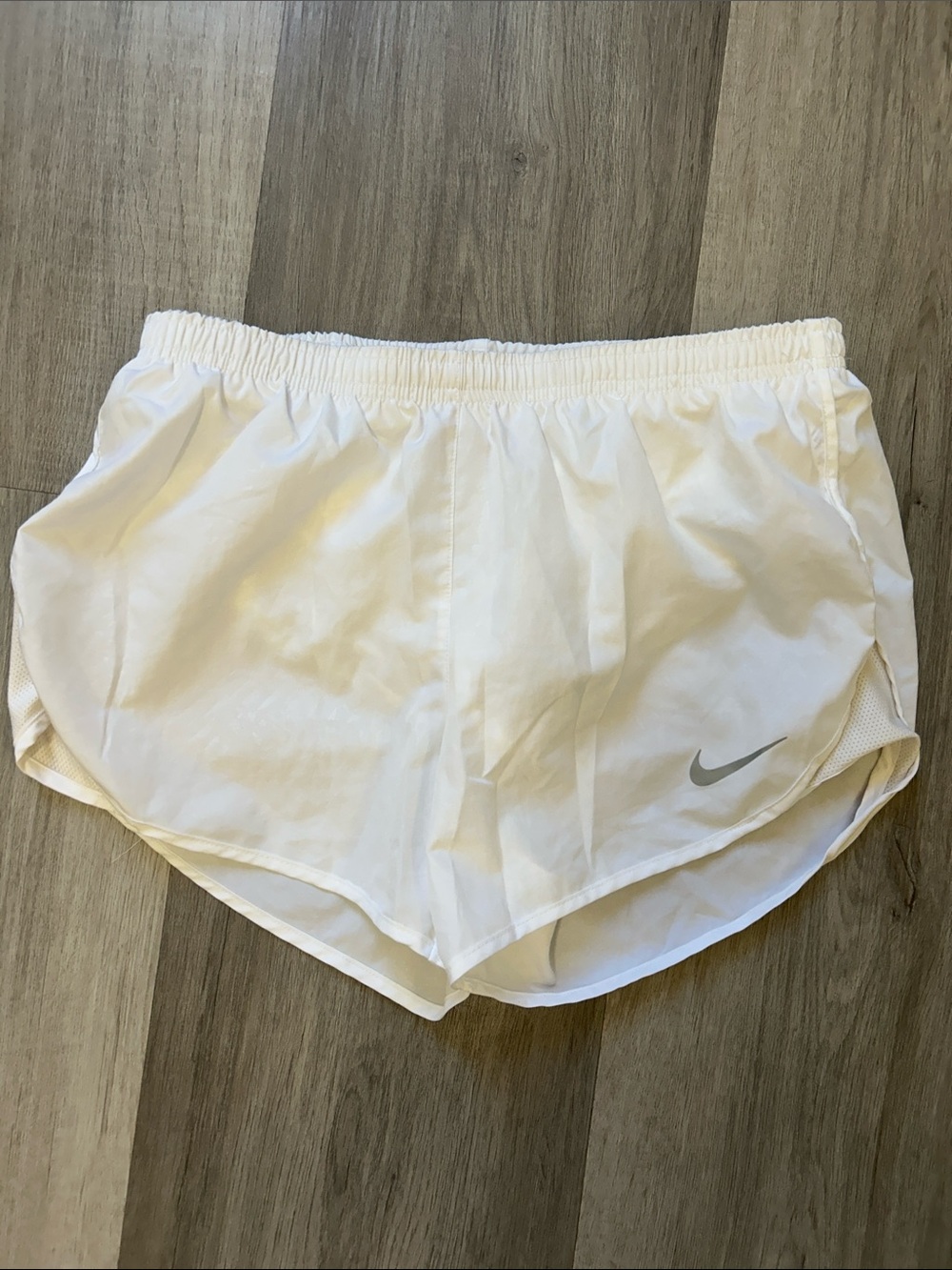 Nike Women’s White Athletic Running Shorts with Silver Swoosh